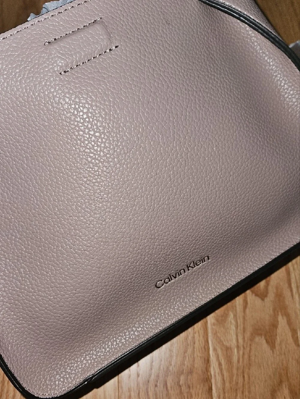 Calvin Klein small neutral tote with gold hardware. Includes a crossbody strap.